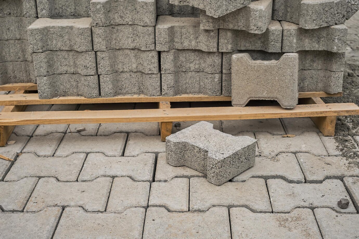 paving-slabs-stacked-pallet-road-repair-process-closeup-selective-focus-tiles-seasonal-reconstruction-pavement-walking-paths-parks_166373-3647